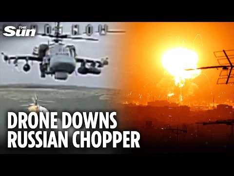 Combat drone smashes into Russian helicopter sending it spiralling into the ground