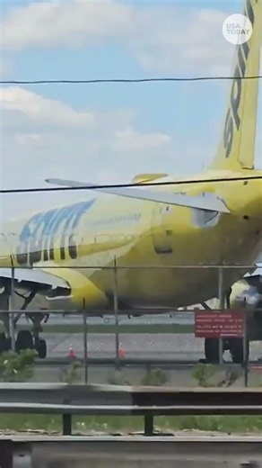 See the moment a plane crashed into a truck and light post injuring a driver in New Jersey