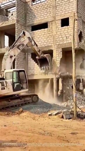 Tearing Down Structures: Excavator - Driven Demolition for Redevelopment