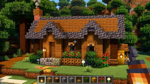 A warm starter home with spruce charm and stone accents
