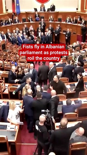 Albanian lawmakers clashed violently in parliament on Thursday (22 October) as widespread protests continued to roil the country for a tenth consecutive day.