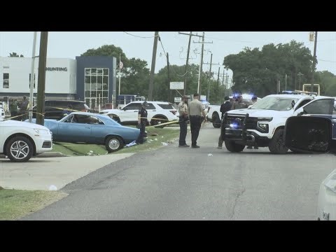 At least 13 hurt after car plows into parade, driver faces multiple charges