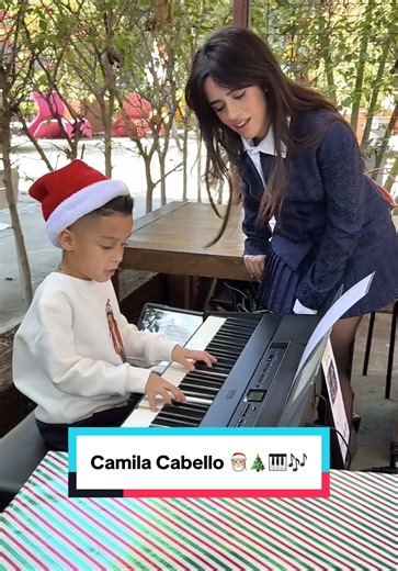 🌟 Jelijah Diaz (7) brought the holiday cheer 🎄 to @Camila Cabello with his incredible piano skills! 🎹 He played All I Want for Christmas Is You like a pro and Camila couldn’t help but groove and sing along, making for an unforgettable moment! 💙🎅🏼🎶
