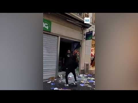 Shopkeepers defend their livelihood from masked looters during the French riots