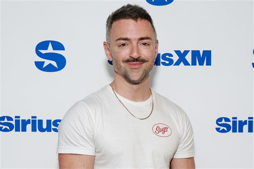 Matteo Lane’s new speedo & workout pics prove touring the world does the body good