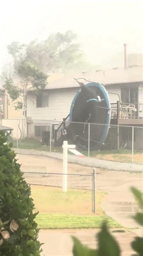 Wind gusts blow trampoline over fence in Salt Lake County