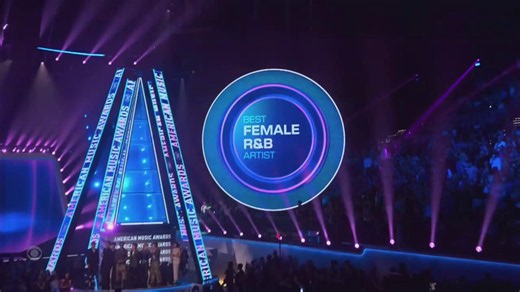 BTS presents SZA with the Best Female R&B Artist award at the #AMAs.