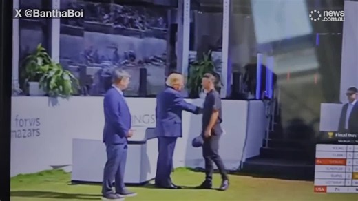 Adam Scott in awkward handshake with Donald Trump