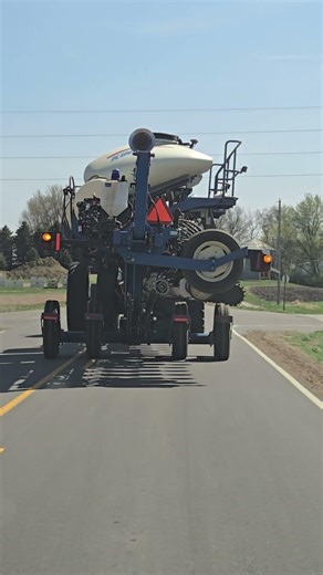 What is this tractor hauling 😱 A planter? #farming #tractor #planting
