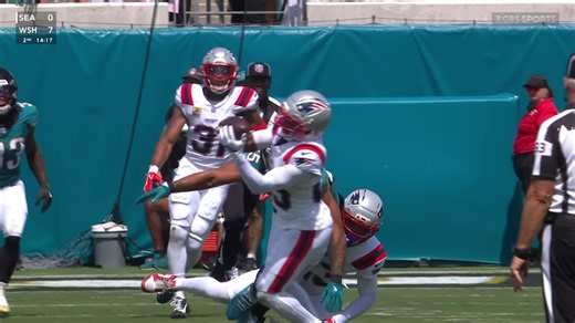Marcus Jones corrals Lawrence's tip-drill INT