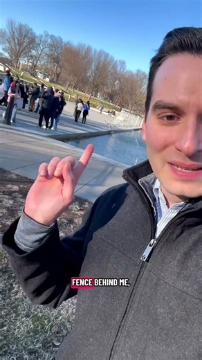 Wind in DC blows fence into reflecting pool
