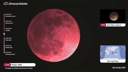 Experience the lunar eclipse as the moon transforms into a blood red hue in this time-lapse video