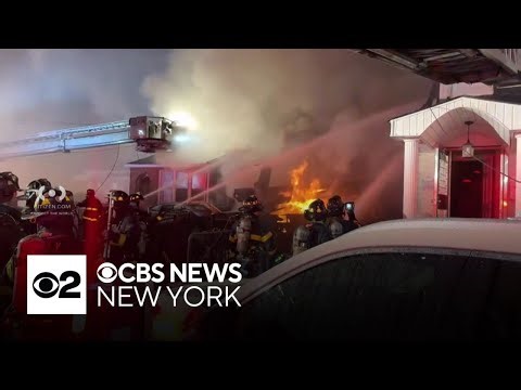 Video shows Queens house explosion as NYPD officers try to enter