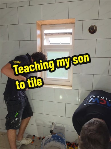 Teaching my son to tile @darrensmith1077 #plumber #mcwdividers #diy #plumbing #dadsoftiktok