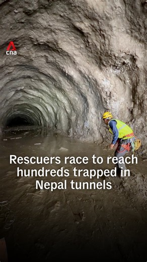 Rescuers race to reach hundreds trapped in Nepal tunnels
