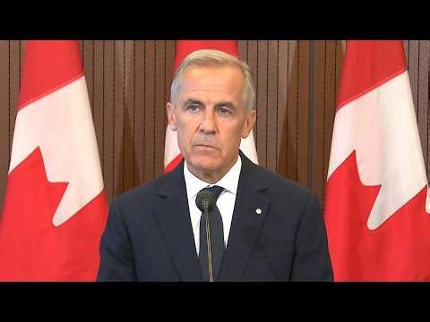 Prime Minister Mark Carney delivers remarks after suspending trade negotiations
