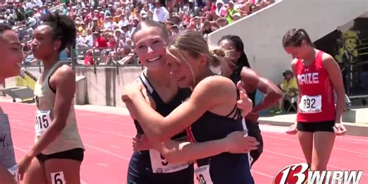 Manhattan's Hanna Pellant and Harli Omli celebrate breaking the 6A 100m dash record together