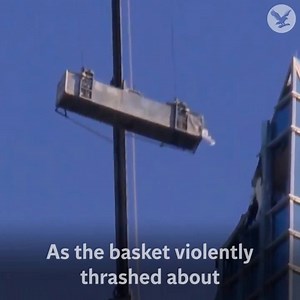 Window cleaners trapped on skyscraper platform as it swings wildly out of control in the wind | The Independent
