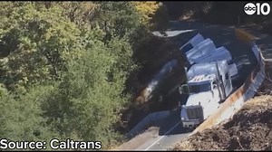 VIDEO: Semi-truck fall off narrow highway in California