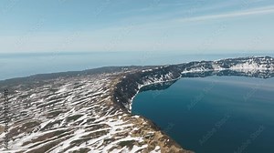 An island in the sea with a large lake in the center, Onekotan Island