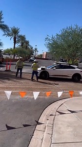 Looks like the machines are not quite ready to outsmart humans yet! 🤖 This Waymo self-driving ride hailing car drove into a closed road construction area in LA 🤦 Check how the workers treat it like a lost farm animal to herd it out! 😂 What would you have done? 💬 Elon's hyping up his Tesla Robotaxi but is the tech for driverless cars ready? From @entartika on X #driverlesscars #robotaxi #Waymo #selfdrivingcars | Smith's Lawyers