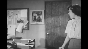 CIRCA 1950s - A teacher teaches a boy about the importance of receiving constructive criticism