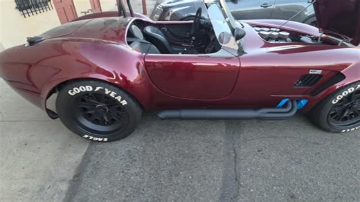 Backdraft Racing Cobra in the shop for custom headers and sidepipes. We kept the silver ceramic in the engine bay—perfect match for the Roush powerplant—while the black ceramic-coated pipes bring it all together. And those decibel readings? 🔥 . #BackdraftRacing #Cobra #GasnPerformance #Roush #CustomExhaust #madeinusa #gasn #roushperformance #roushmustang | GASN Performance Exhaust