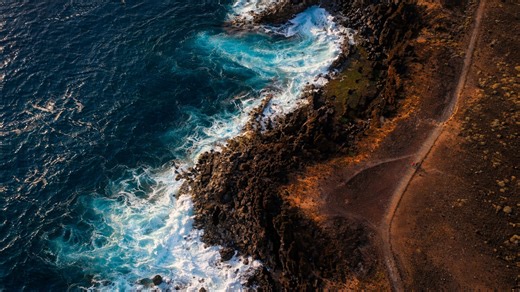 The rugged coastline carved by endless waves