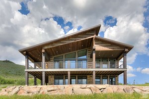 5.4K views · 49 reactions | This modern hand-hewn log home design on the North shore of Henry’s Lake, Idaho utilizes our 16″ Hand-Hewn EverLog Concrete Log Siding in our deeper Natural Brown color accented with Weatherall’s Stone chinking. Build the Best Log and Timber Home at EverLogs.com | EverLog Concrete Log Systems | Facebook