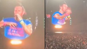 Chris Martin stops Coldplay gig midway through song to ask crowd not to use cameras or phones