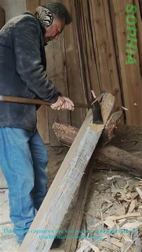 Traditional Woodworking: Artisan Shaping a Log with Hand Tools
