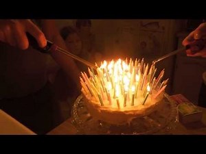Lighting and blowing out 100 birthday candles