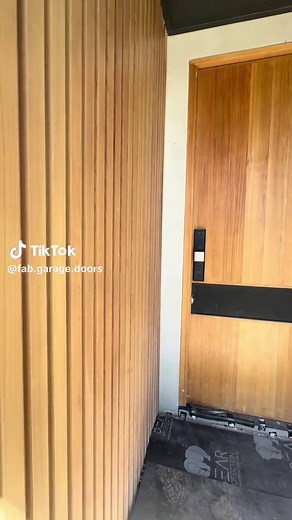 Custom Garage Door Transformation with Decowood Cladding