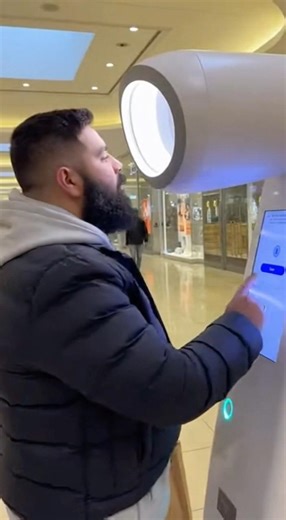 The Future of Grooming? 🤖 Automated Shaving Machine at the Mall!