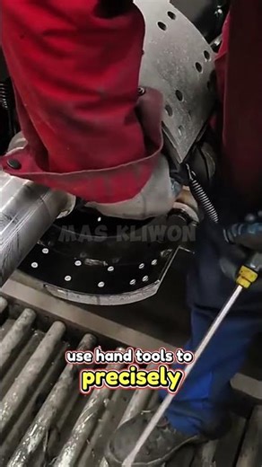 An efficient manual process for assembling drum brakes.