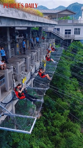 Speed, thrill, and stunning views—all in one unforgettable ride on this exhilarating zipline at Zhangjiajie National Forest Park, central China's Hunan Province! | People's Daily, China