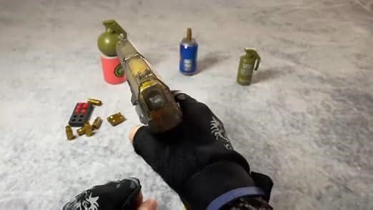 toy pistol with shell ejecting action