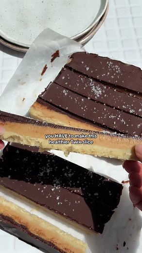 I couldn’t even count how long it’s been since I’ve made a raw slice. Life has got ridiculously bust lately so this raw slice is perfect as it’s actually quite simple with not any weird ingredients 🙌🏽 1 1/2 cups almond meal 1/4 cup coconut oil 1/4 cup maple syrup 1 cup smooth peanut butter 2 tbsp melted coconut oil 1/2 cup coconut cream 1/4 cup maple syrup 1 tsp vanilla essence 120g dark chocolate 1 tbsp coconut oil Add the almond meal, coconut oil and maple syrup to a bowl and mix to combine.