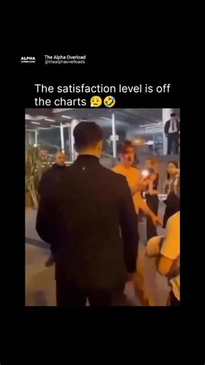 Alpha Overload on Instagram: "He’s never gonna do that again 😂 This video captures a moment of “instant karma” that has resonated with millions of viewers online. The footage shows a shirtless man acting aggressively and shouting in a public plaza at night. His confrontational behavior is directed toward a group of people, creating a tense atmosphere in an otherwise busy urban setting. The climax occurs when a bystander, seemingly fed up with the shirtless man’s disruptive behavior, delivers a 
