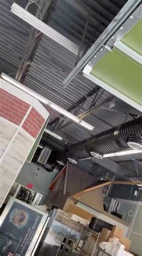 How to manually open a commercial garage door safely.