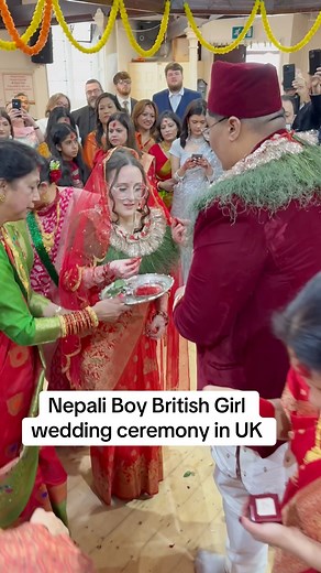 **"A Beautiful Fusion: Nepali Boy & British Girl’s Wedding in Bristol, UK with Traditional Naumati Baja Splendor!"** 💍🎶 Love knows no borders, and this magical wedding in **Bristol, UK**, proved just that! A handsome **Nepali groom** and his beautiful **British bride** celebrated their union in a dazzling blend of **Nepali tradition and British charm**, complete with the mesmerizing sounds of a **Naumati Baja**—the iconic nine-instrument ensemble that brought the vibrant spirit of Nepal to the