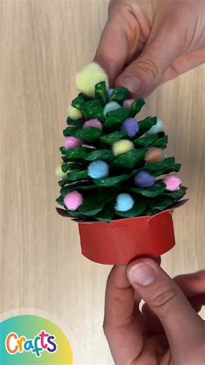 Twinkl Plus on Instagram: "🎄 We’re pine-ing for a crafty Christmas! 🌲✨ Bring a little rustic sparkle to your festivities with our Pine Cone Christmas Tree Craft! Turn a humble pine cone into a Christmas show-stopper using green paint, colourful pom-pom lights, and a shining star on top ⭐🎨 Mounted on a festive red cardboard base, it’s the perfect decoration for tables, trees, or gifting with love 💚♻️ 👉 Click the link in our bio to start your Christmas crafting today! 👈 #twinkl #twinklcrafts