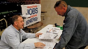 Japan's economy shrinks 7% in last quarter, risks recession