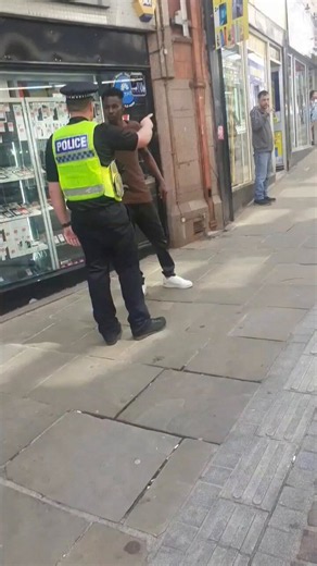 A West Yorkshire police officer has been placed under investigation after a video went viral showing him pushing an African migrant away from shops he had been harassing.UK officers are allowed to let white kids bleed out, but God forbid one of their migrants gets shoved.