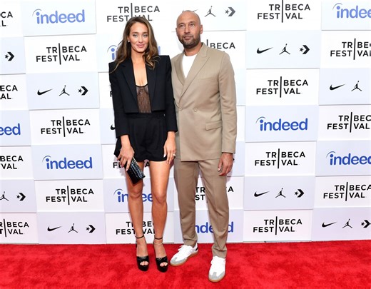 Derek Jeter's wife Hannah turns heads in blue asymmetric outfit at his celebrity golf tournament red carpet