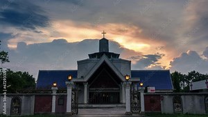 Mysterious polar cloud iridescence phenomenon glowing over christian church and cross shape religious Stock Video