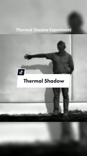 Conducted sometime in the late 1940s or early 50s by the U.S. Army, the experiment shows radiation heat transfer occurs at the speed of light. When you cast a visible light shadow you also cast a thermal shadow, interrupting this process. This is seen in the video where the person is stopping the absorption of the sun’s heat on the wall. This along with a cooling breeze and a clear sky, allows the wall to cool. As he walks away his shadow remains. In an atomic blast where this is no natural cool