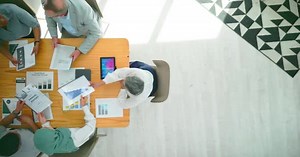 Collaborative Team Meeting from Above in Office