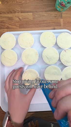 Eilish Shepherd | Modern Wedding Cake Designer | Derbyshire on Instagram: "Give your guests a little piece of the luxury to take home (or eat immediately—we don’t judge!). 🤍 Our edible favours are designed to perfectly complement your wedding cake, creating a seamless and sophisticated look for your big day. From these monogrammed cupcakes to luxurious macarons and artisan chocolate bon bons, I can create the perfect “wow factor” add-on to your wedding cake order. Enquire about adding favours t