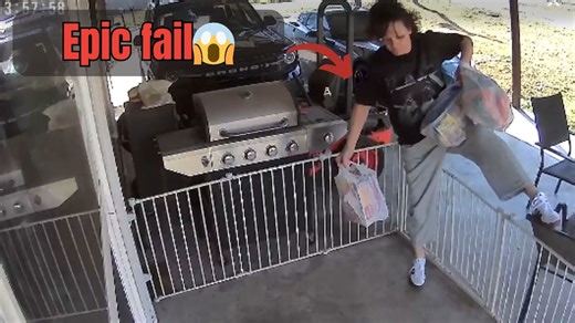 Woman trips over gate while balancing several grocery bags